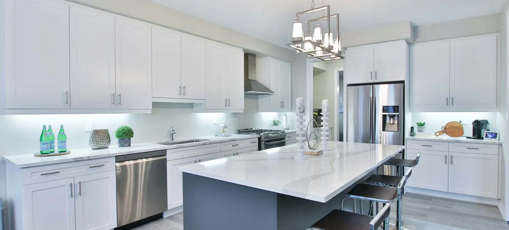 Kitchen remodeling Los Angeles modern white kitchen with island and quartz countertops