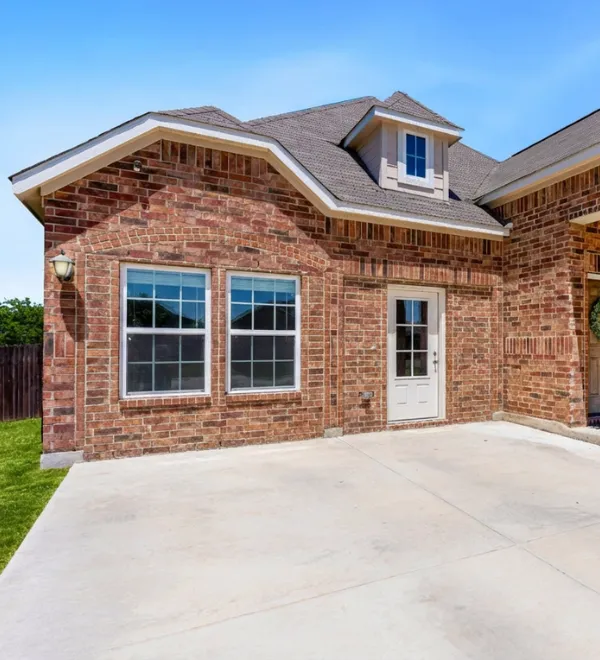 Garage transformation Los Angeles converted brick garage into living area